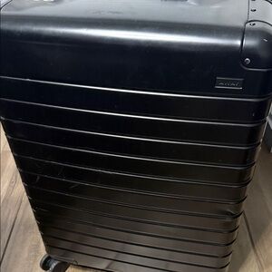 Away Black Rolling Suitcase